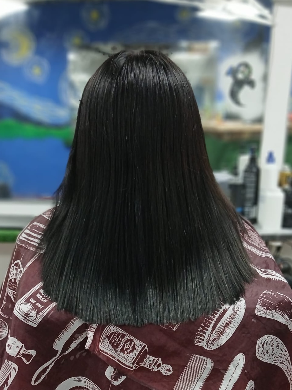 Corte recto en cabello liso realizado en Rocky&Chely